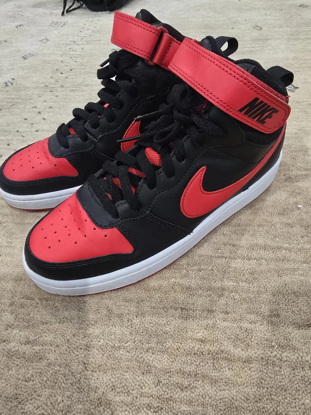 Nike High Top Sneakers in Black & Red